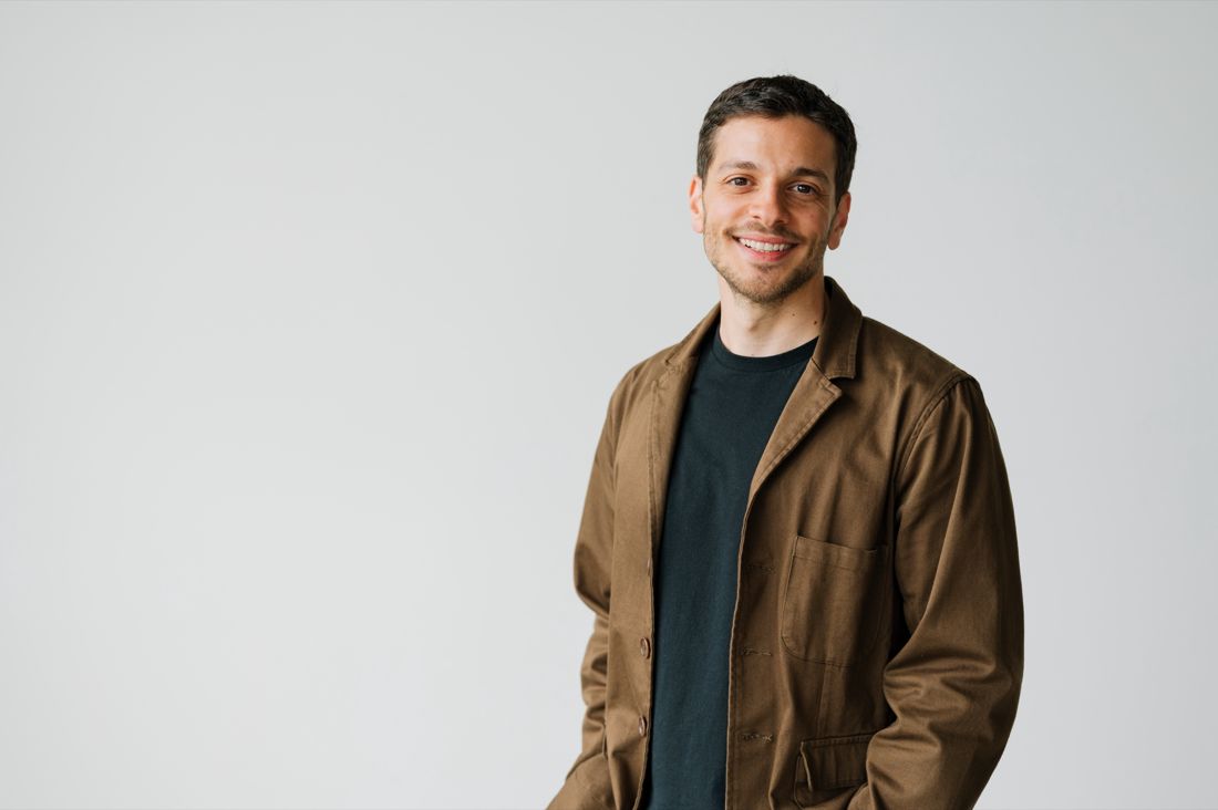 Michael Nazari in a brown jacket